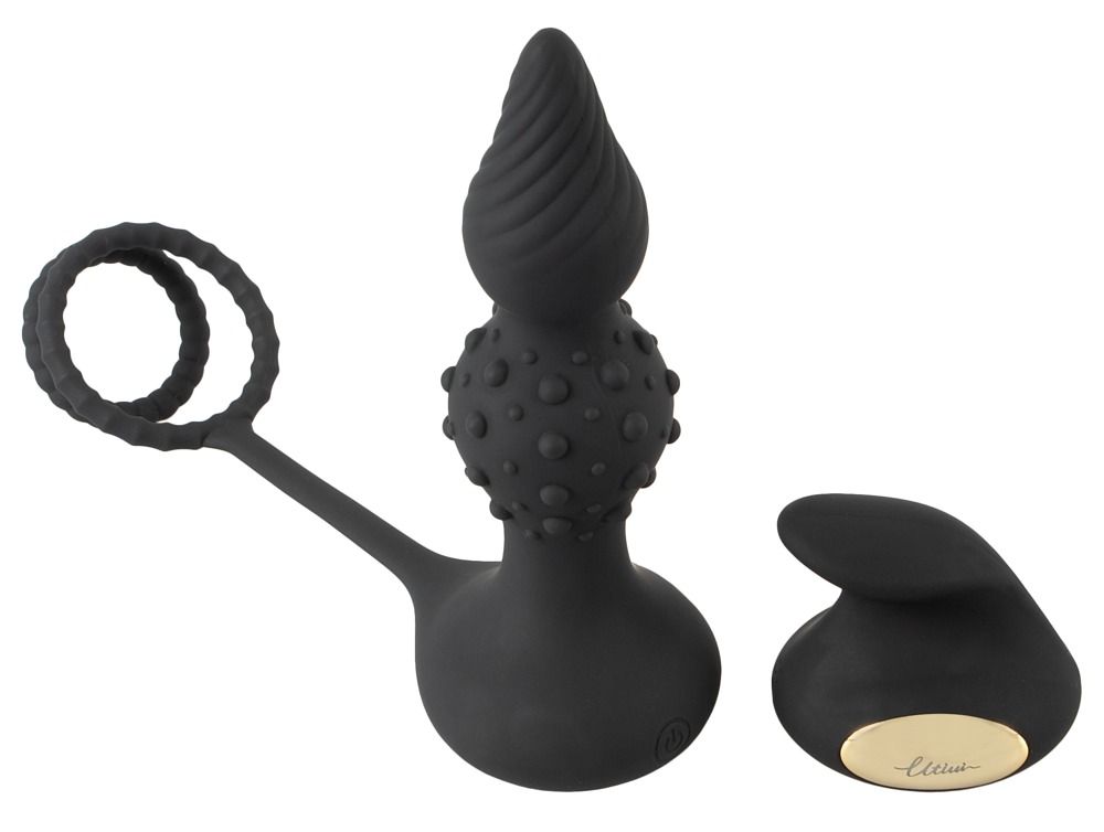 Schwarzer Analvibrator mit gerillter Spitze, Noppen und einem Ring.
