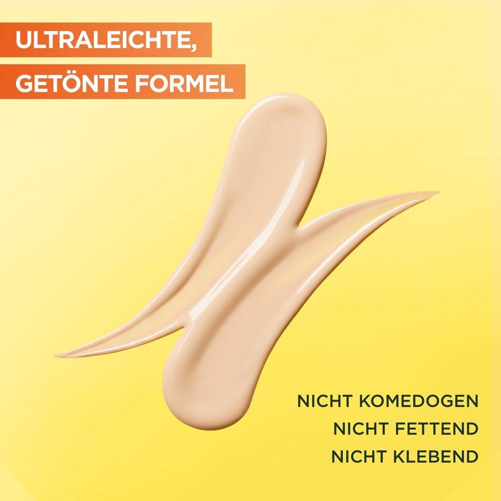 Gelbe Textur auf gelbem Hintergrund. Text: Ultraleichte, getönte Formel. Nicht komedogen, nicht fettend, nicht klebend.