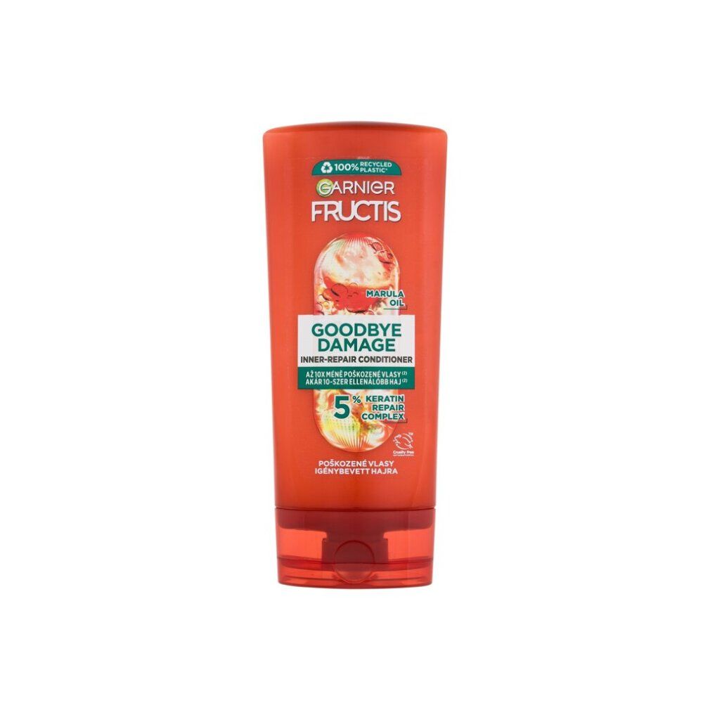 Orangefarbene Tube mit Garnier Fructis Goodbye Damage. Text: Inner-Repair Conditioner, 5% Keratin Complex.