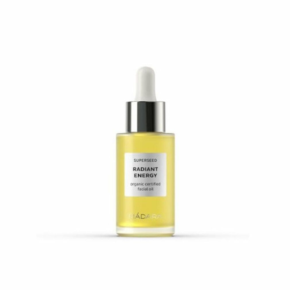 Klarer Glasflakon mit gelbem Öl, silberner Kappe und Pipette. Aufschrift: SUPERSEED RADIANT ENERGY, organic certified facial oil, MADARA.