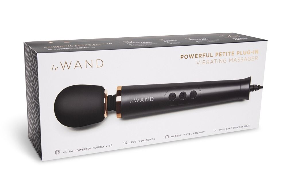 Produktverpackung mit Massagegerät. Text: Powerful Petite Plug-In Vibrating Massager.