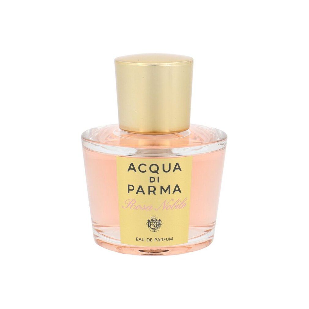 Acqua di Parma Rosa Nobile Flakon. Goldfarbene Kappe, rosa Flüssigkeit. Gelbes Etikett mit Logo und Schriftzug.