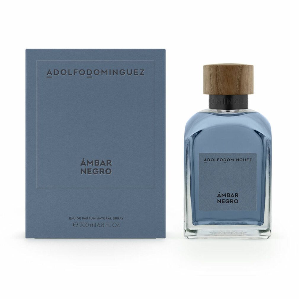 Parfümflasche und Schachtel. Auf der Schachtel und dem Flakon steht ADOLFODOMINGUEZ und ÁMBAR NEGRO. Holzdeckel auf der Flasche.