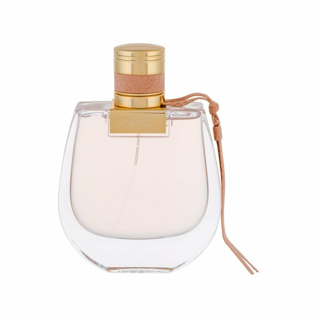 Parfümflakon mit goldfarbenem Verschluss und beigem Lederband. Aufschrift: Nomade Eau de Parfum.