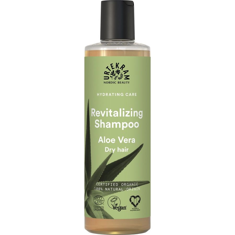 Shampoo-Flasche mit schwarzem Deckel. Aufschrift: Revitalizing Shampoo, Aloe Vera, trockenes Haar. Zertifizierungen: Vegan, Bio.
