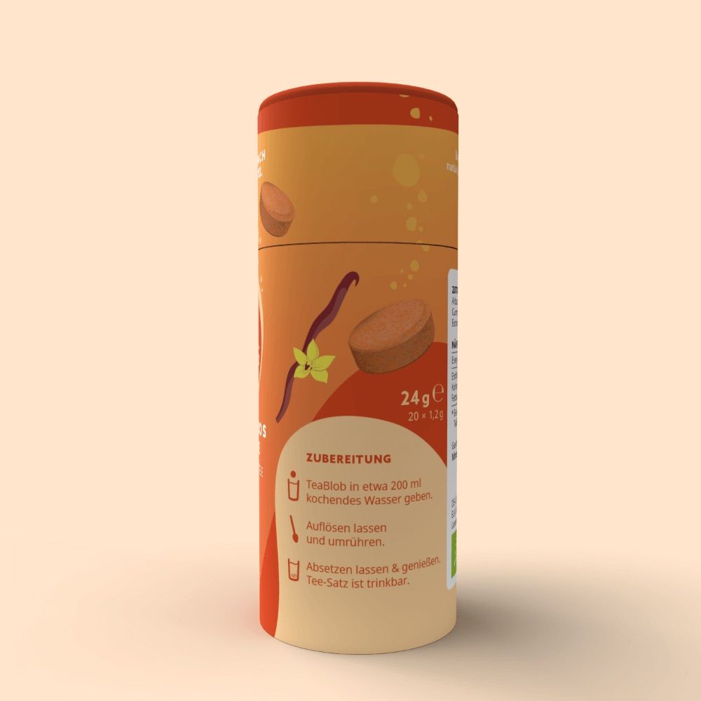 Orangefarbene Röhre mit Vanille- und Teeblatt-Illustrationen. Enthält 24g Produkt in 20 Tabletten.