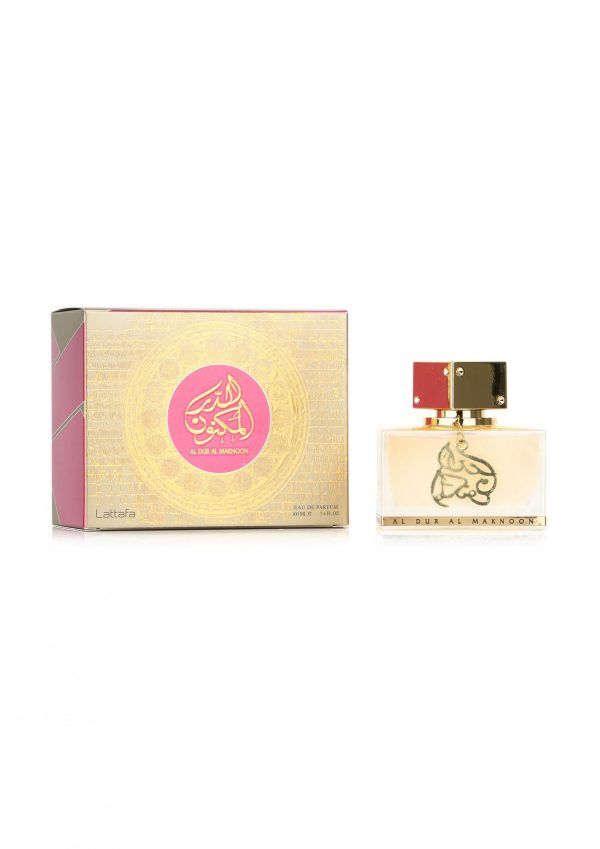 Parfümflakon und Verpackung. Goldfarbener Flakon mit rotem Verschluss. Rosa-goldene Verpackung mit arabischer Schrift.