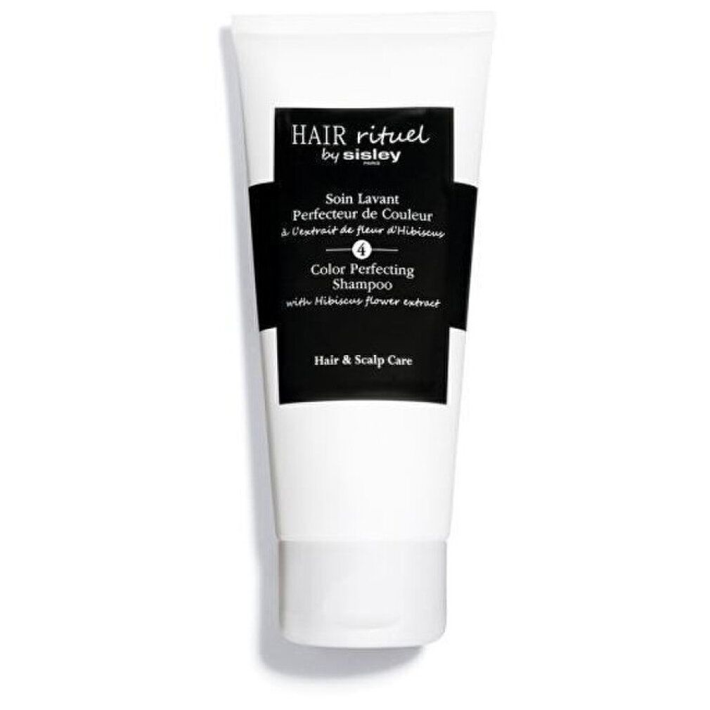 Weißer Tubenshampoo. Schwarzes Etikett mit Schriftzug: Hair Rituel by Sisley, Color Perfecting Shampoo mit Hibiskus-Extrakt.
