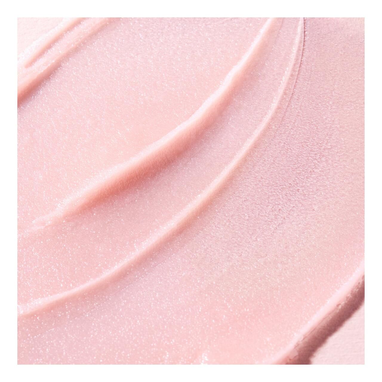 NUXE Very Rose Lippenbalsam. Rosa Tiegel mit rosa Deckel. Produktname und Logo sichtbar.