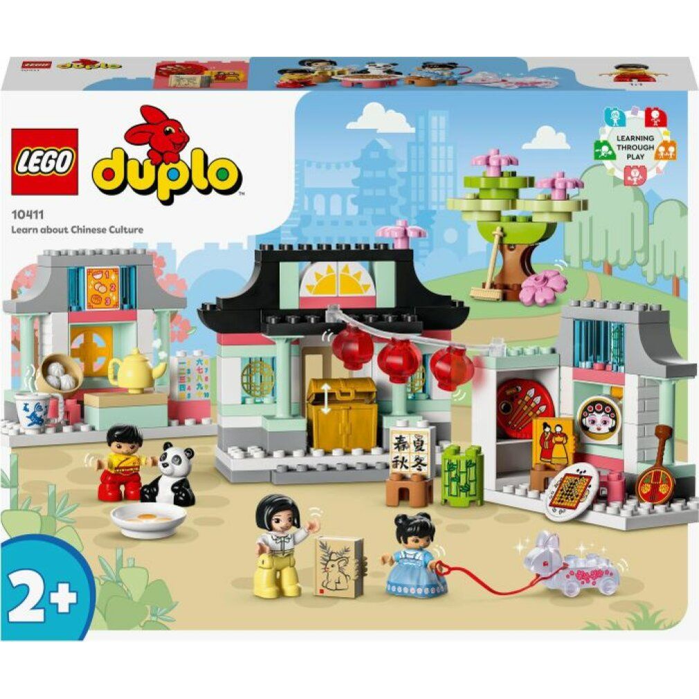 LEGO Duplo Set. Enthält Gebäude, Figuren und Zubehör. Verpackung mit Produktname und Altersempfehlung.