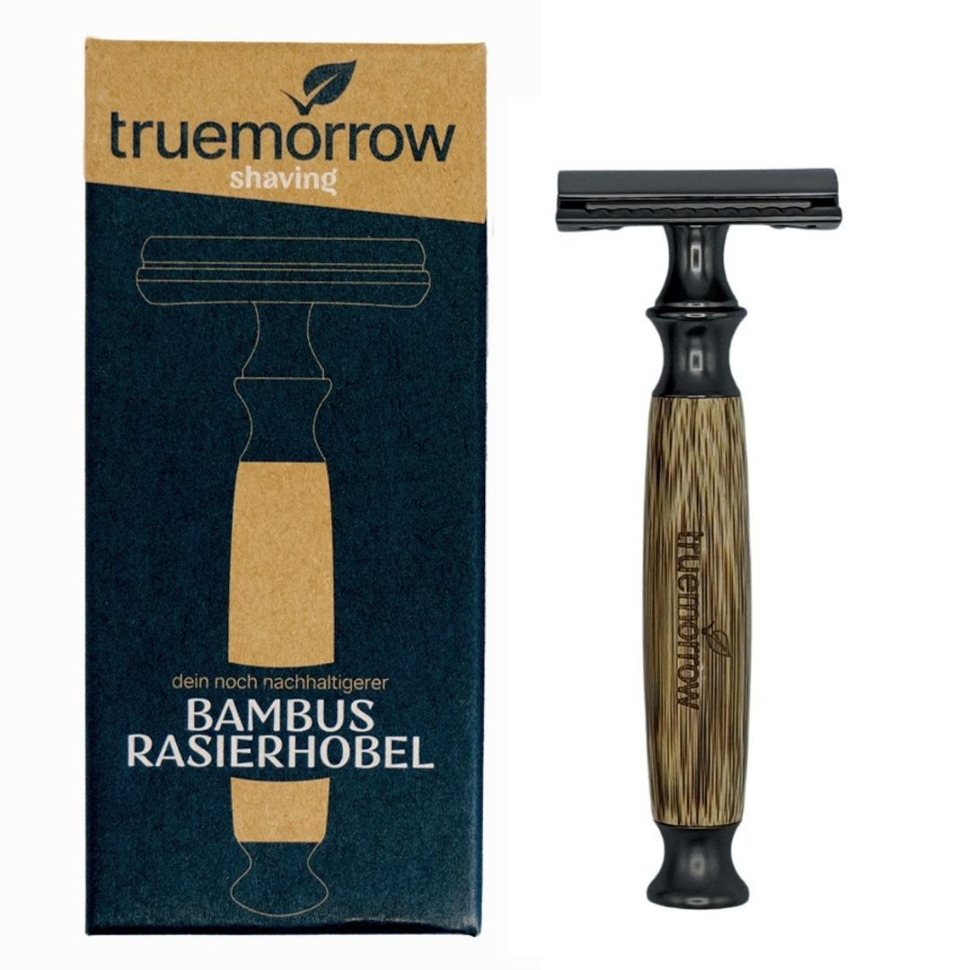 Rasierhobel aus Bambus mit Geschenkverpackung. Anthrazitfarbener Kopf und Griff aus Bambus. Verpackung mit Logo und Produktbezeichnung.
