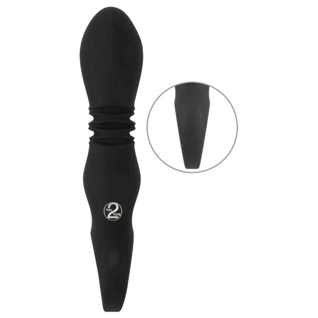 Schwarzer Vibrator. Glatte Oberfläche, geriffelte Mitte, ovale Form, abgerundete Spitze, Kreis mit Zahl 2.