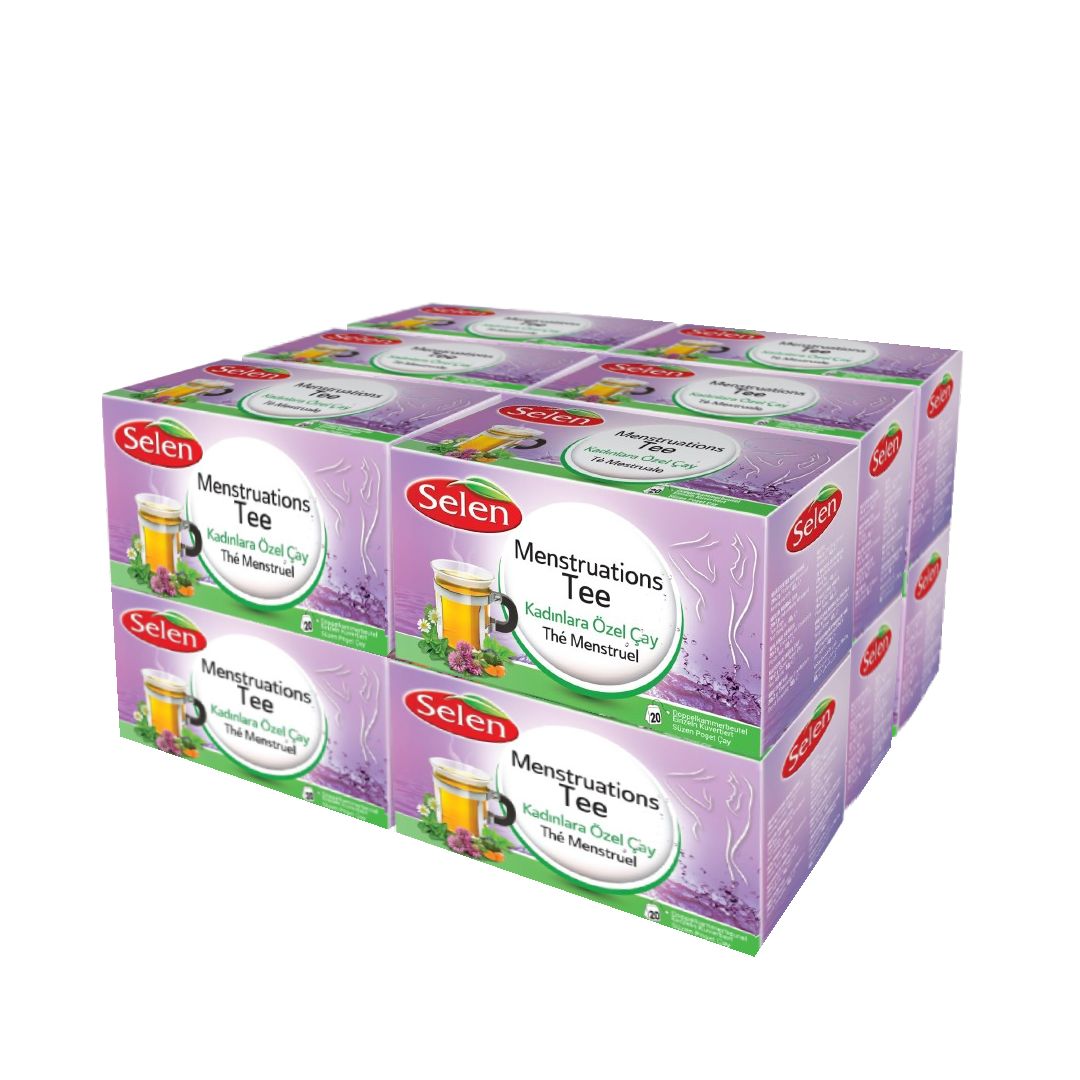 Mehrere Packungen SELEN Menstruations Tee. Lila Verpackung mit Produktnamen und Abbildung eines Getränks. Stapelweise angeordnet.