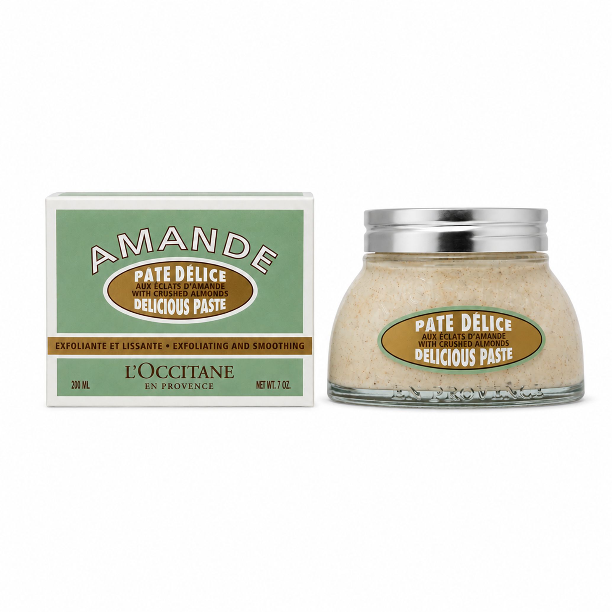 Glas mit Mandel-Peelingpaste und Kartonverpackung. Aufschrift "AMANDE PATE DELICE". Marke: L'Occitane.