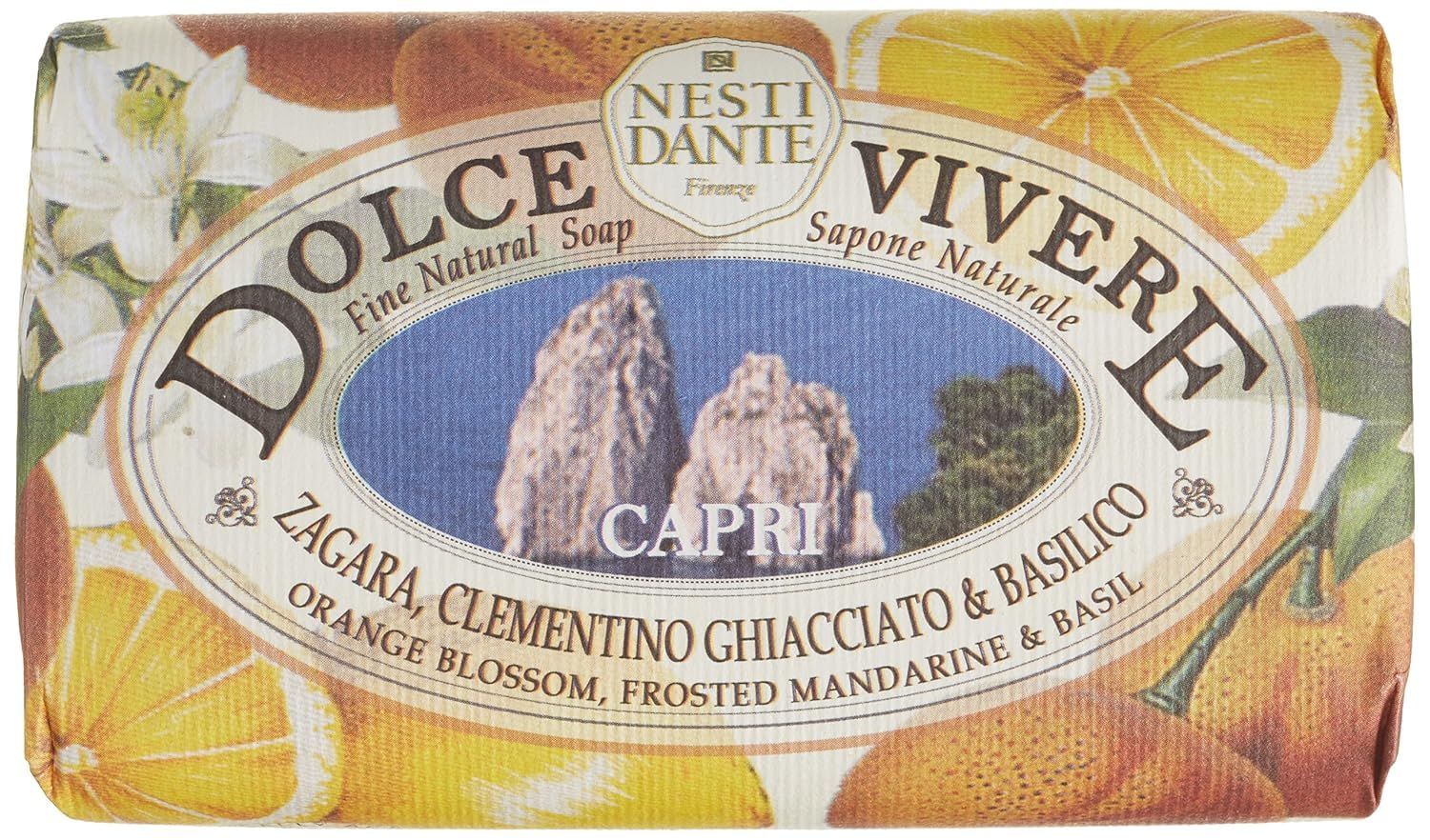 Seife mit Verpackung. Ovales Etikett mit Schriftzug Dolce Vivere Capri. Abbildung von Zitrusfrüchten und Felsen.