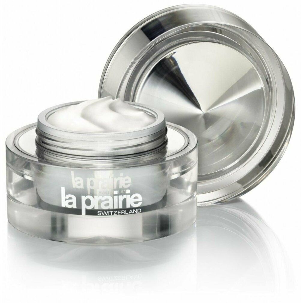 Offener Cremetiegel mit silberfarbenem Deckel. Creme sichtbar. Marke: La Prairie. Herkunftsland: Schweiz.