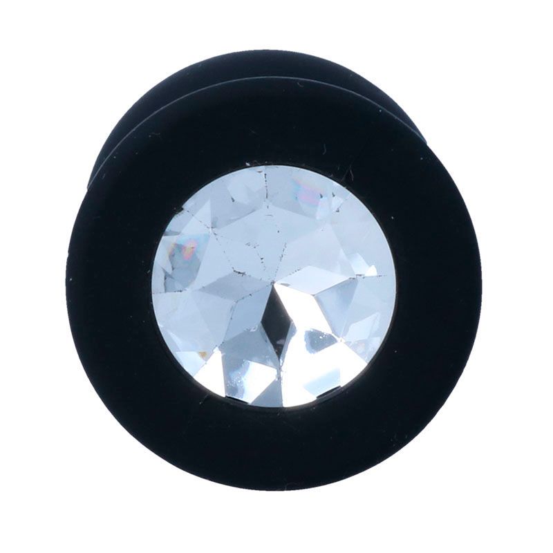 Nahe Ansicht des schwarzen Analplugs mit Kristallverzierung.