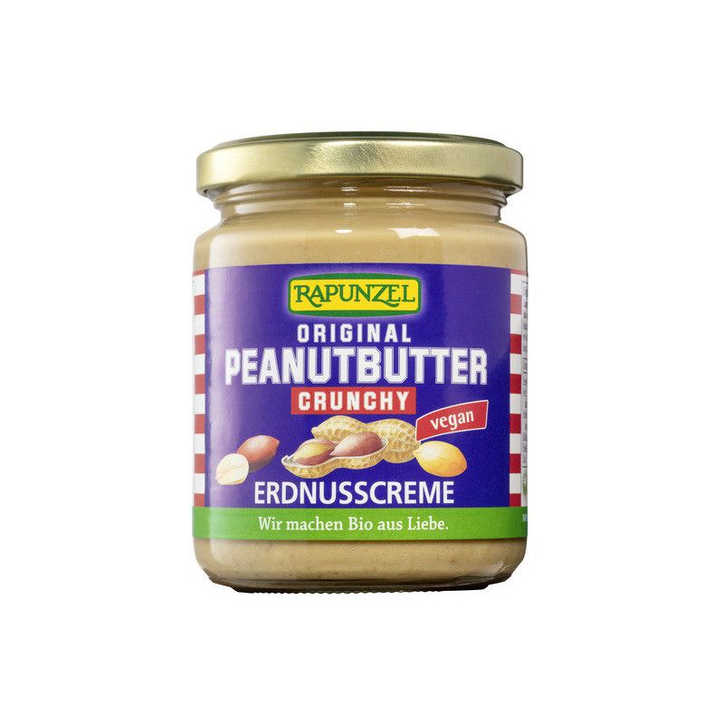 Glas mit Erdnusscreme. Aufschrift: Rapunzel, Peanutbutter Crunchy, vegan. Abbildung von Erdnüssen. Deckel goldfarben.