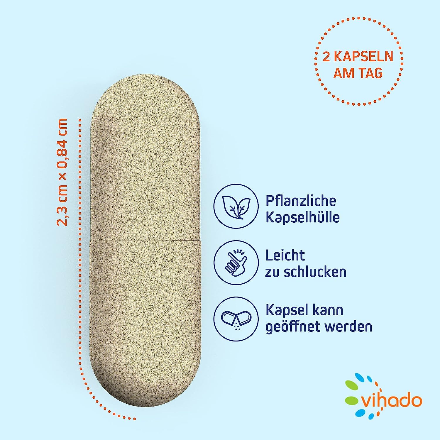 Eine einzelne, beige Kapsel von Vihado Haut Vitamine. Die Kapsel ist 2,3 cm x 0,84 cm groß. Auf der Abbildung sind Informationen über die pflanzliche Kapselhülle, die leichte Schluckbarkeit und die Möglichkeit, die Kapsel zu öffnen, angegeben.