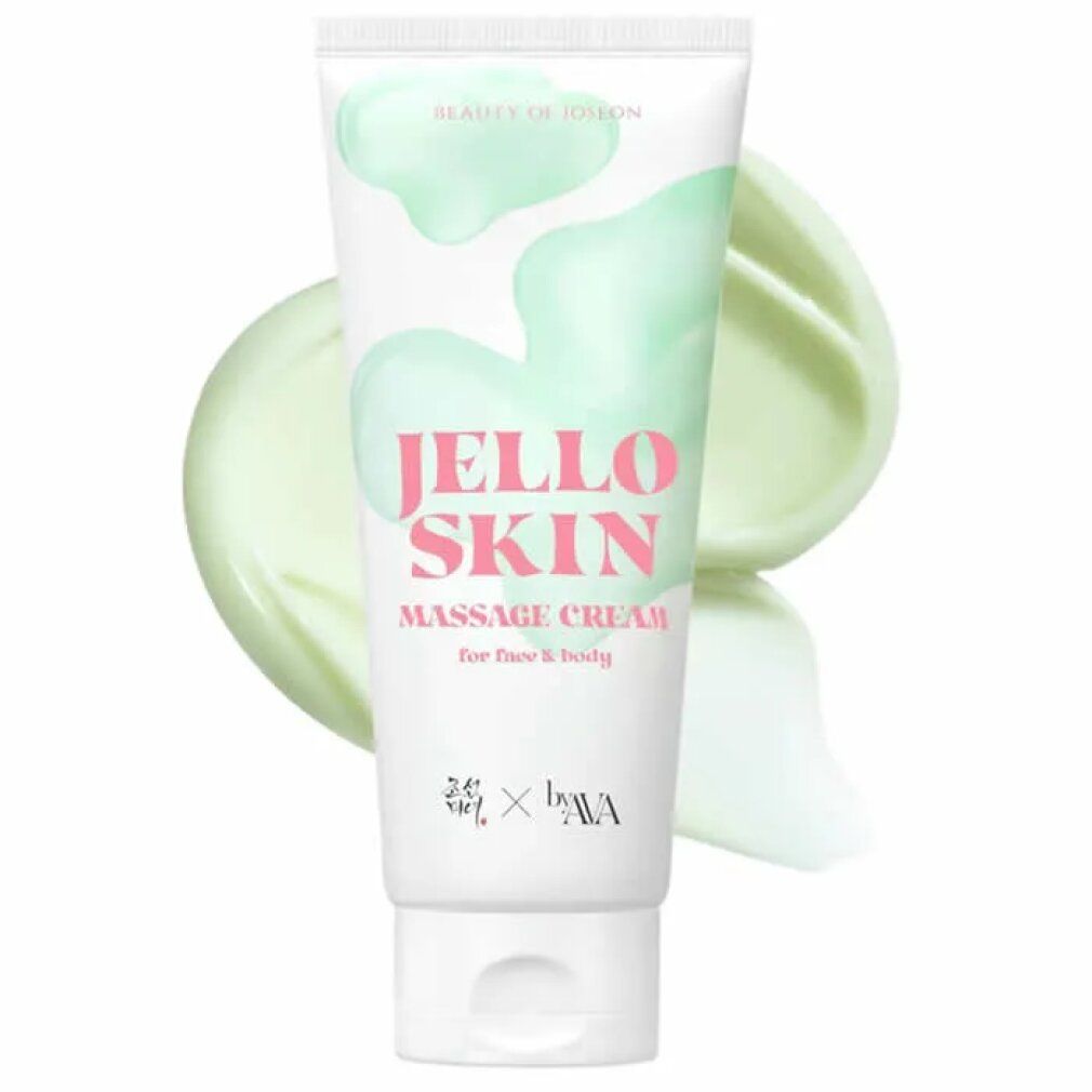 Weiße Tube mit "Jello Skin Massage Cream" Aufschrift, umgeben von grüner Creme.