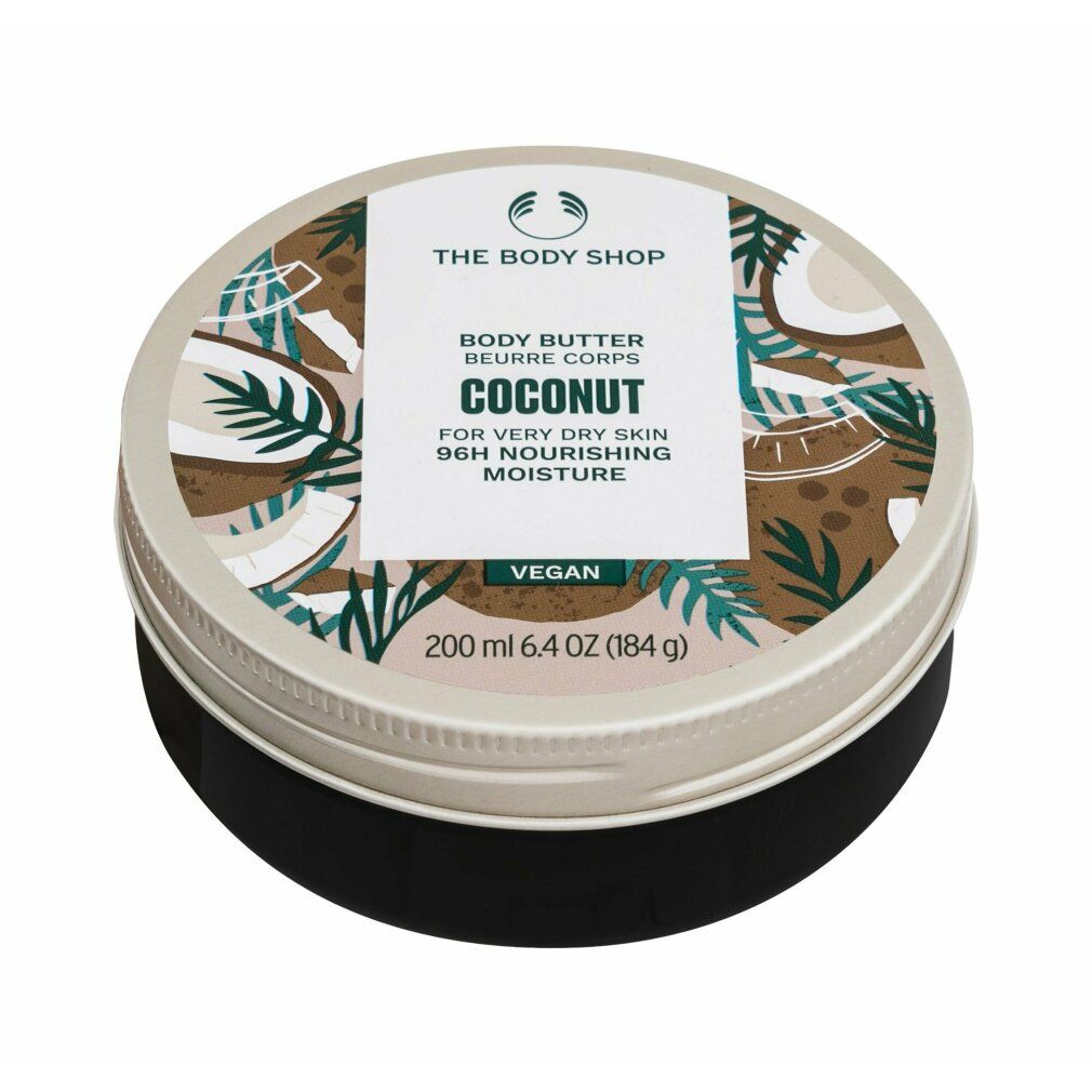 Runde Dose Body Butter, Kokosnuss-Design. Aufschrift: The Body Shop, Body Butter, Kokosnuss, für sehr trockene Haut, vegan. Inhalt: 200 ml. Schwarzer Boden.