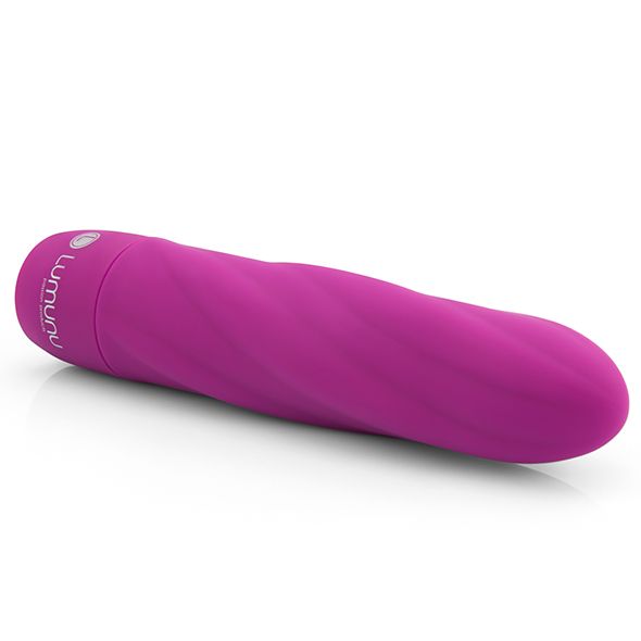 Pinkfarbener Vibrator mit spiralförmiger Oberfläche. Das Produkt liegt auf einer Oberfläche.