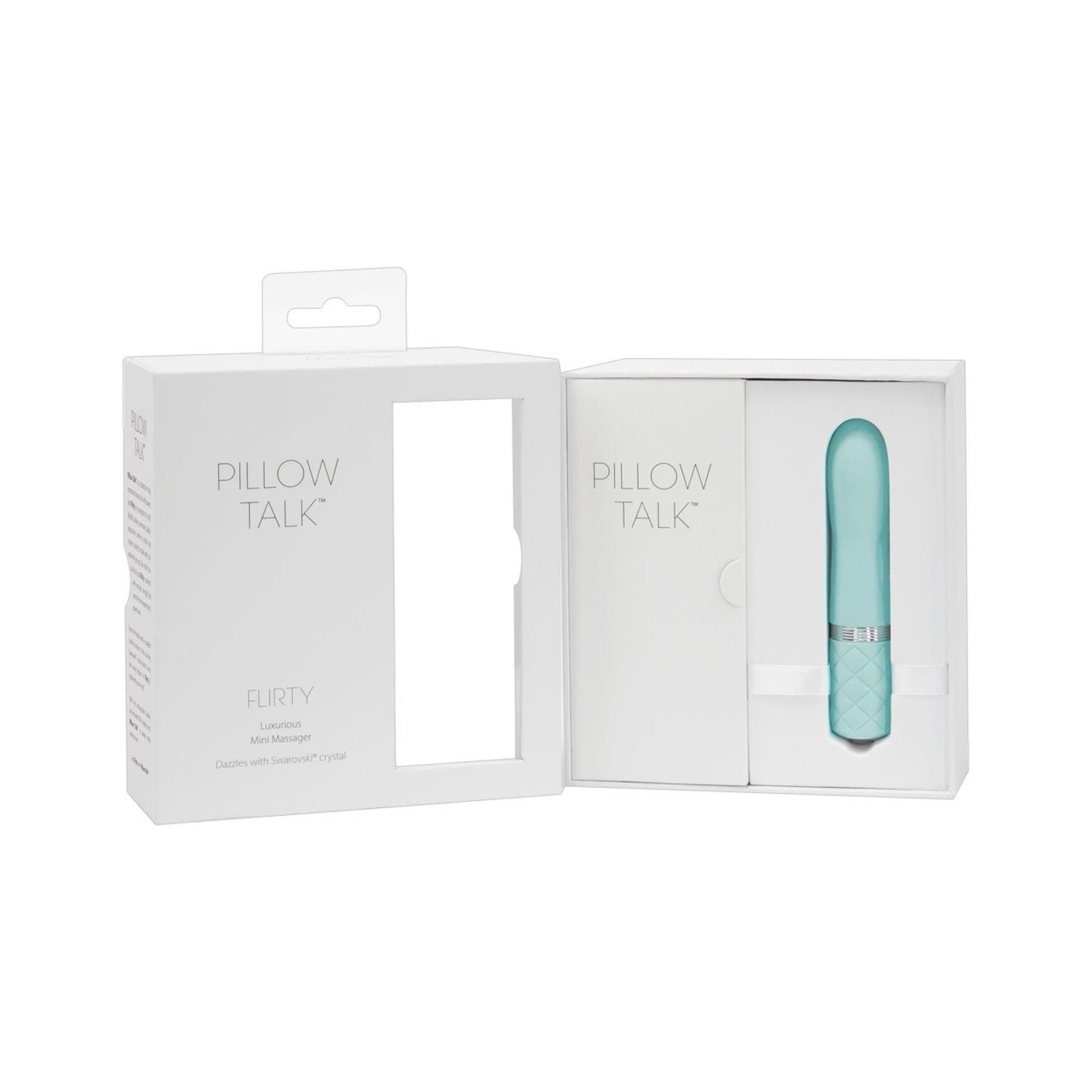 Geöffnete weiße Verpackung mit türkisfarbenem Vibrator. Aufschrift: Pillow Talk, Flirty.