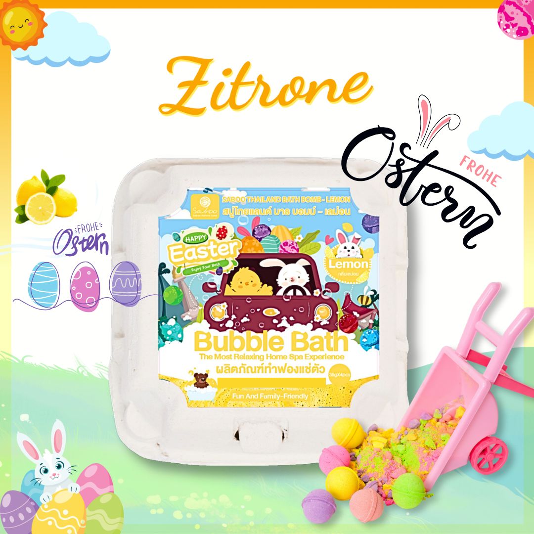 Verpackung mit Badebomben, Aufdruck: Happy Easter, Zitrone. Ostereier und eine Schubkarre mit bunten Kugeln.