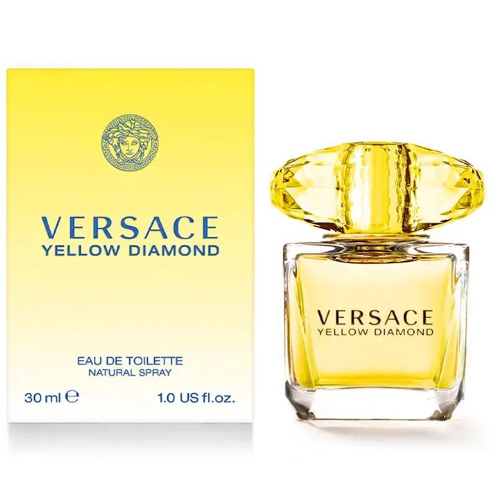 Gelbe Versace Yellow Diamond Flasche und Verpackung. Flasche mit Kristallverschluss. Aufschrift: Versace, Yellow Diamond, Eau de Toilette.