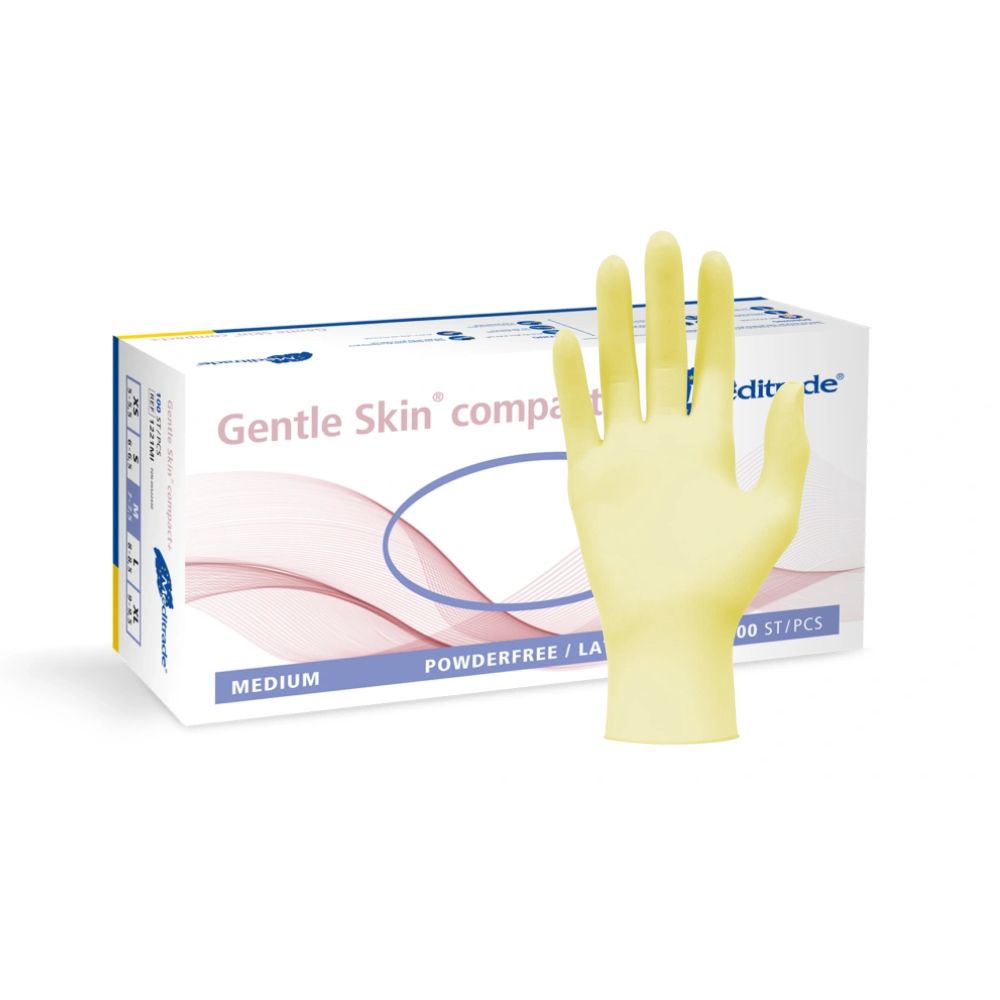 Meditrade Gentle Skin compact+ guanto monouso in lattice. Mano gialla, accanto a scatola. MEDIUM, senza polvere/lattice. 100 pezzi.