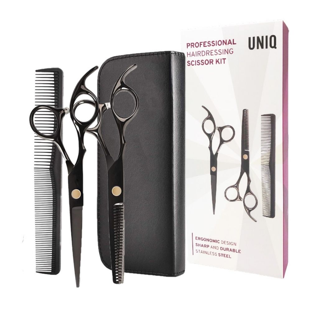 Friseurset mit zwei Scheren, Kamm und schwarzer Tasche, verpackt in Karton.