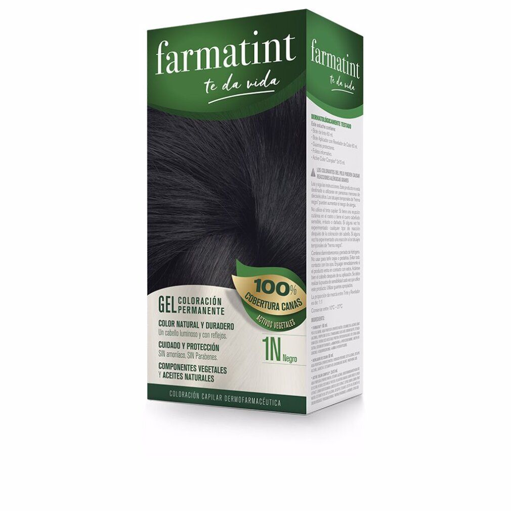 Schachtel mit Haarfärbemittel. Produktname und Farbton 1N Negro. Grün-weiße Verpackung mit Produktabbildung.