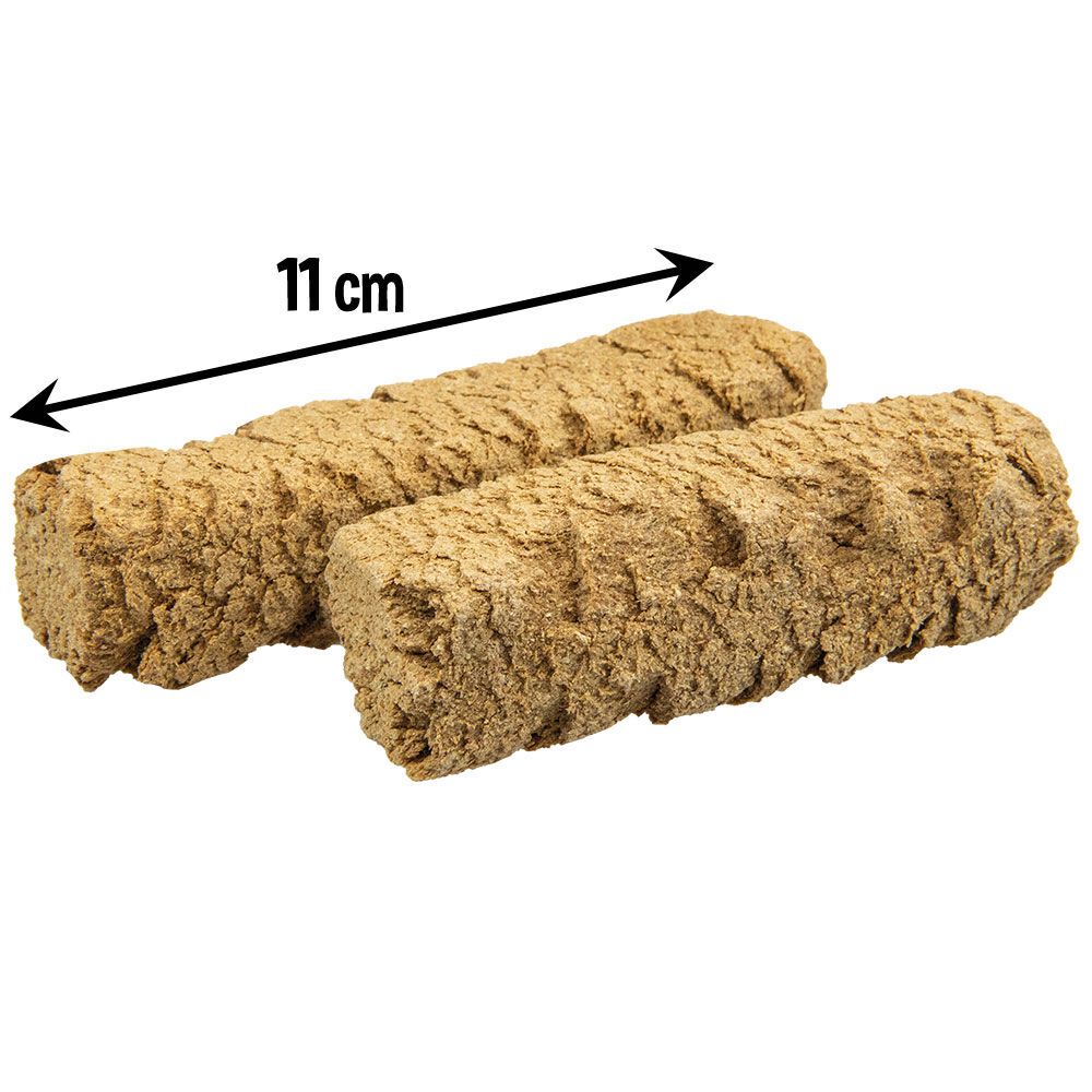 Zwei Hundekuchen, beige, mit rauer Oberfläche, mit einer Längenangabe von 11 cm.