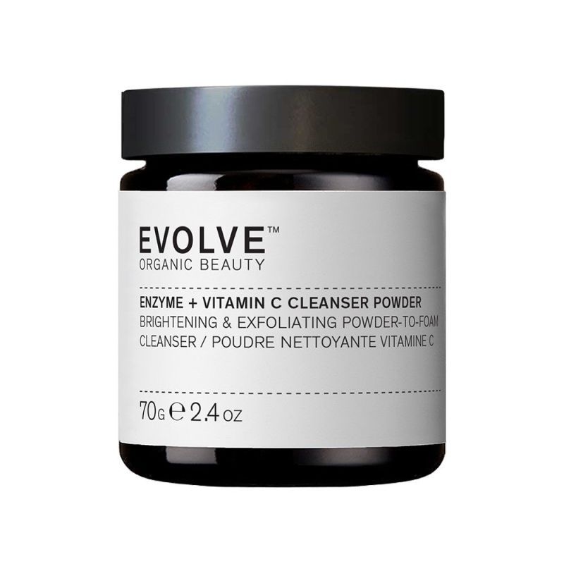 Schwarzes Glas mit weißem Etikett. Aufschrift: EVOLVE ORGANIC BEAUTY, Enzyme + Vitamin C Cleanser Powder, 70g e 2.4 oz.