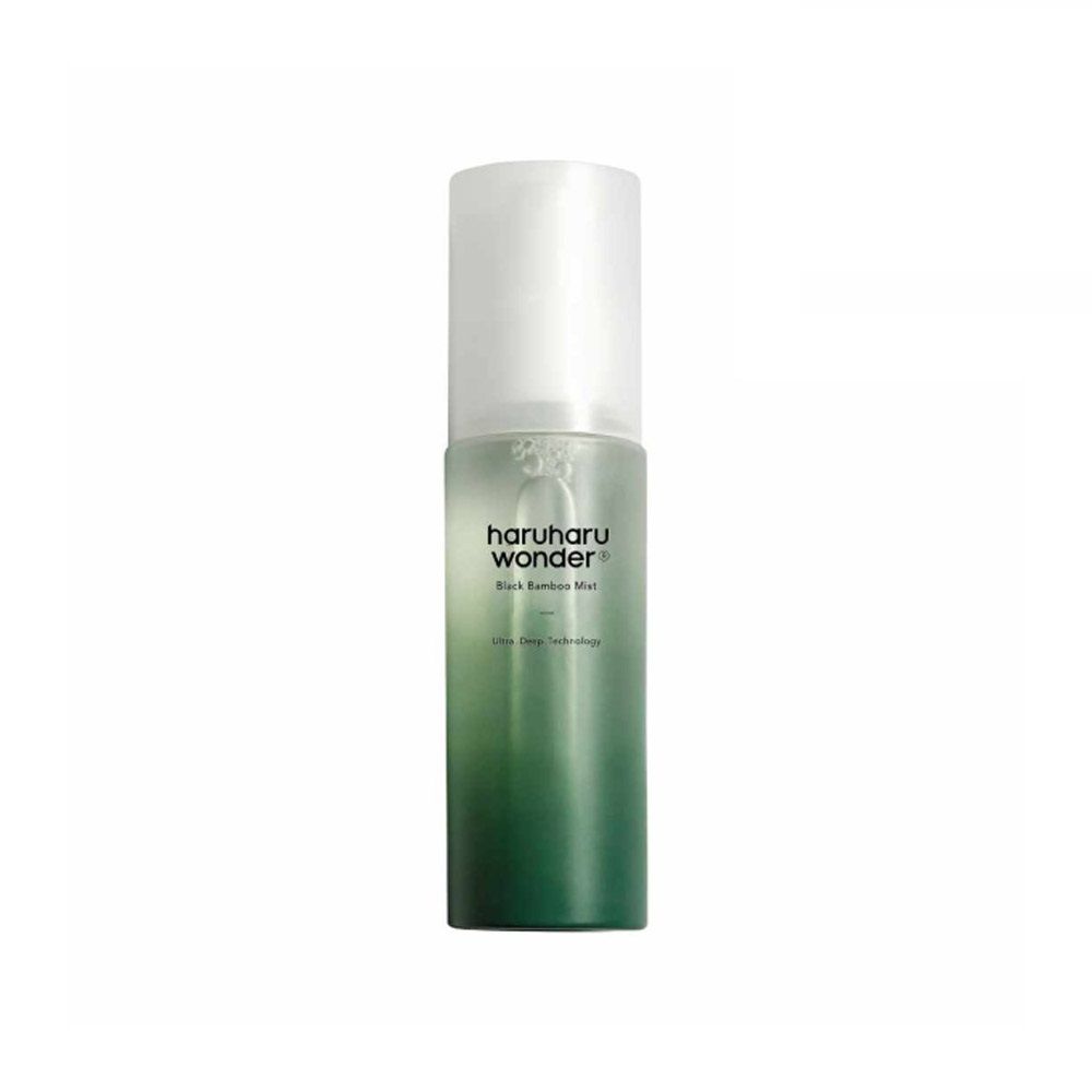 Zylindrische Flasche mit weißem Deckel. Aufschrift: haruharu wonder Black Bamboo Mist. Farbverlauf von Grün nach Transparent.