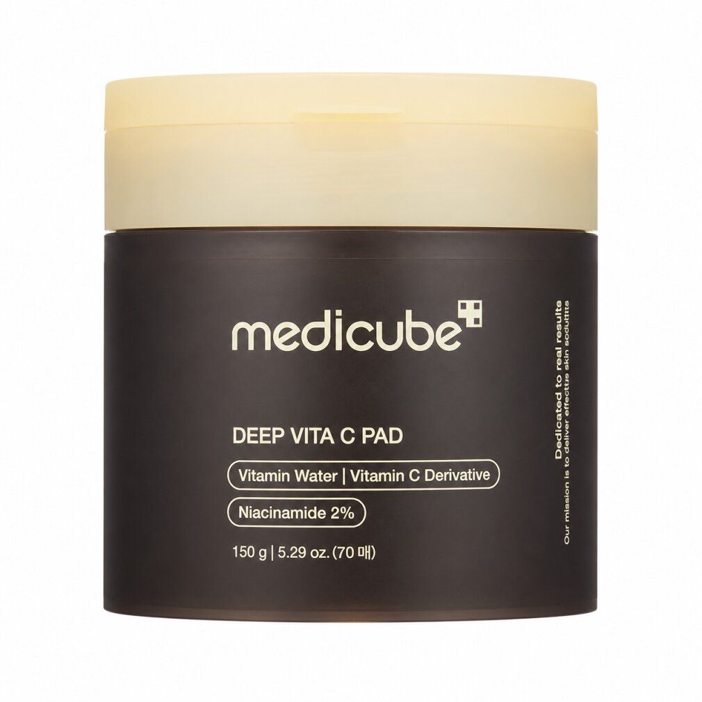 Zwei Seiten eines Medicube Deep Vita C Pads: glatt und geprägt.