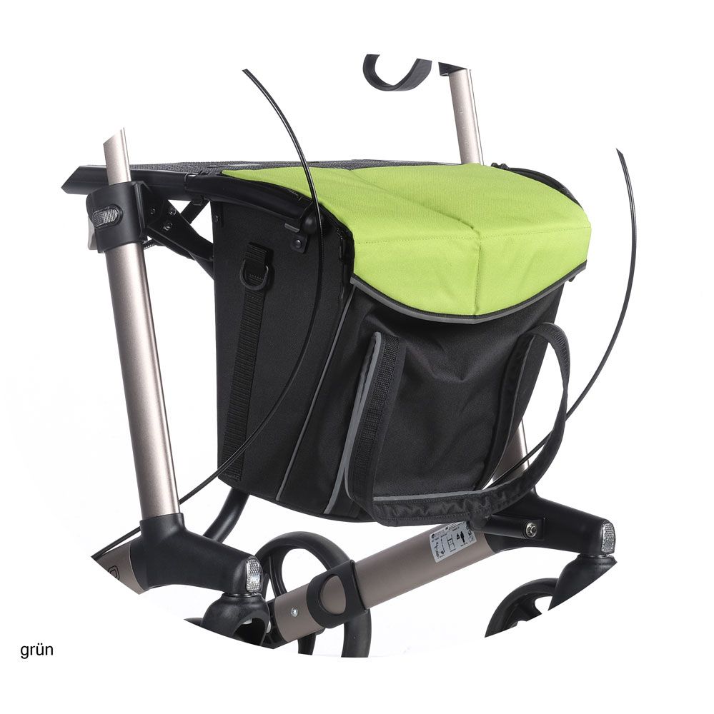 Schwarze Tasche mit grünem Deckel an einem Rollator. Graue Details und Tragegriffe. Reflektierende Elemente.