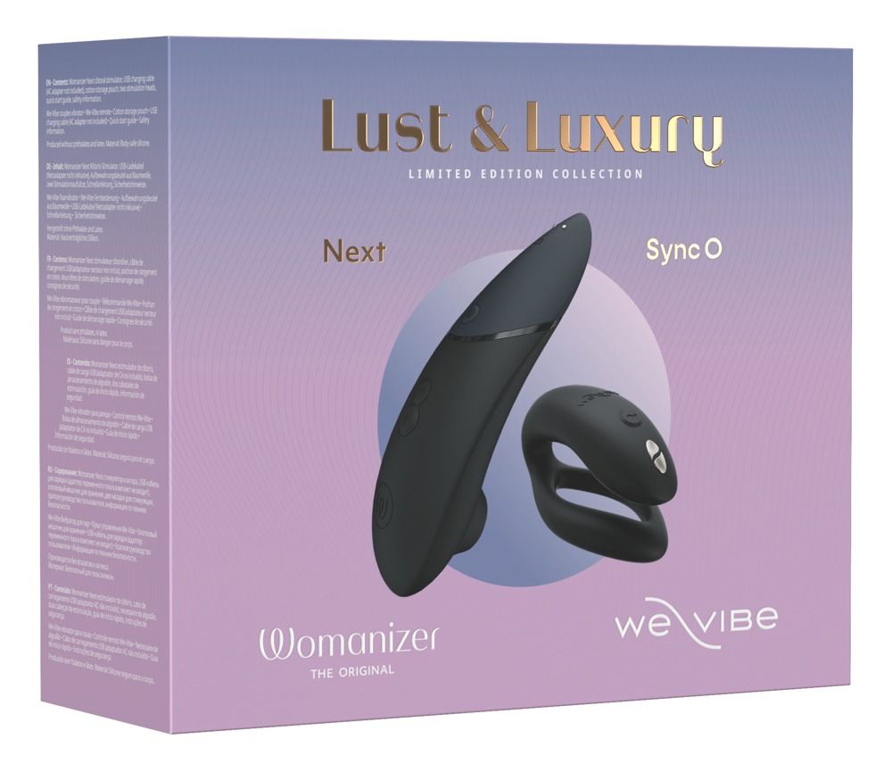 Verpackung der Womanizer Lust & Luxury Collection. Enthält zwei schwarze Produkte. Schriftzug: Lust & Luxury, Womanizer, we vibe.