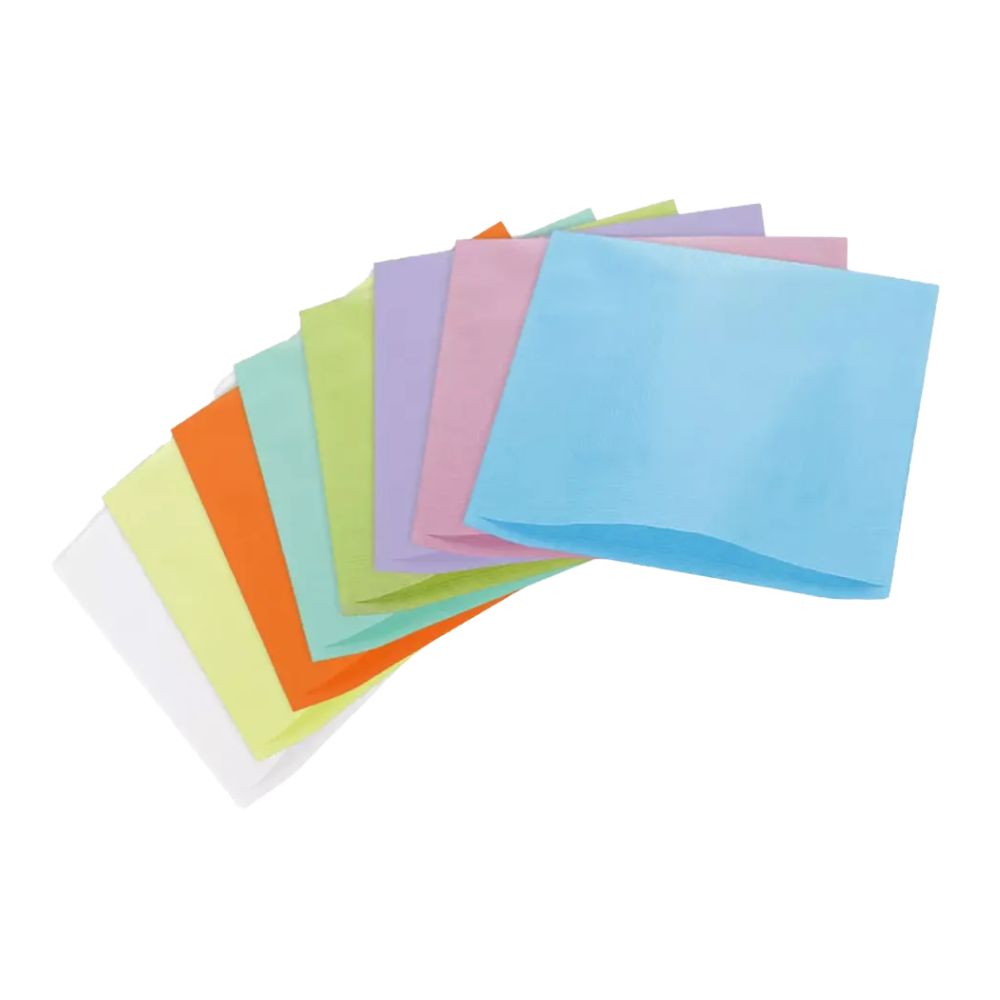 Mehrfarbige Kopfstützenschoner aus Tissue-Papier, in Fächerform angeordnet. Farben: Weiß, Gelb, Orange, Grün, Lila, Rosa, Blau.