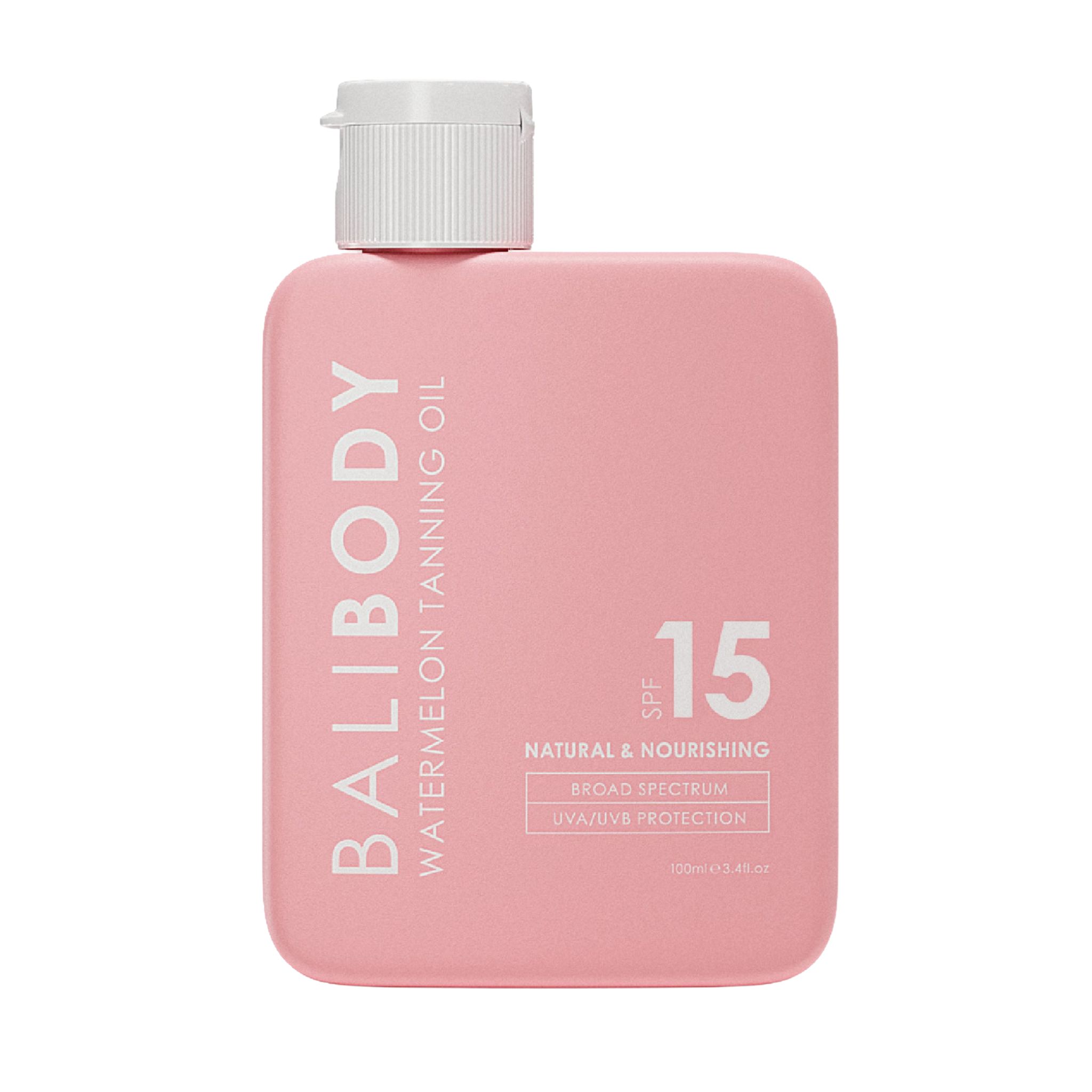 Rosa Flasche mit weißem Deckel. Aufschrift: BALIBODY WATERMELON TANNING OIL SPF 15. Text: NATURAL & NOURISHING, BROAD SPECTRUM UVA/UVB PROTECTION.