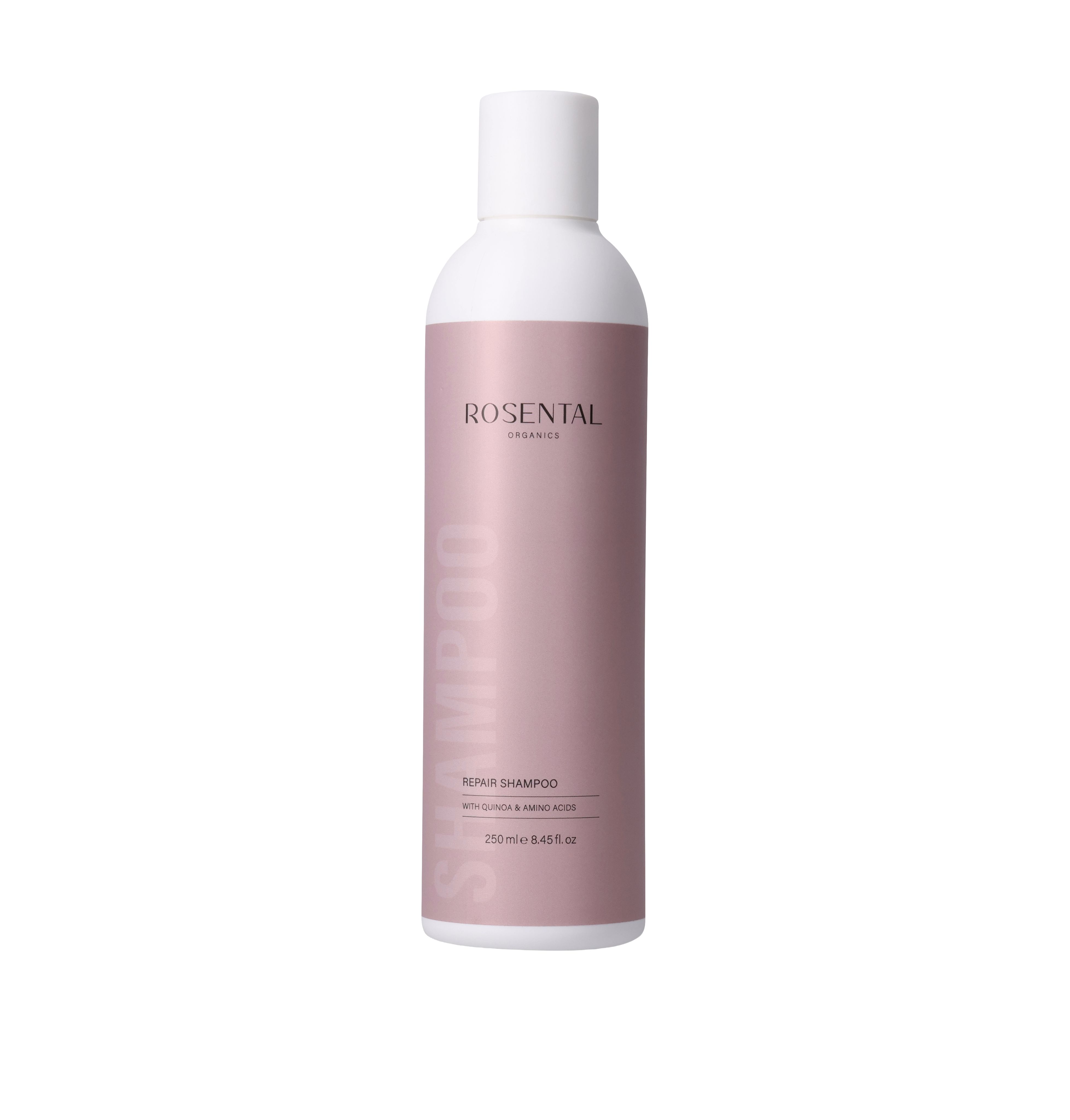 Eine rosa Shampoo-Flasche mit weißem Deckel. Auf der Flasche steht "Rosental Organics Repair Shampoo".