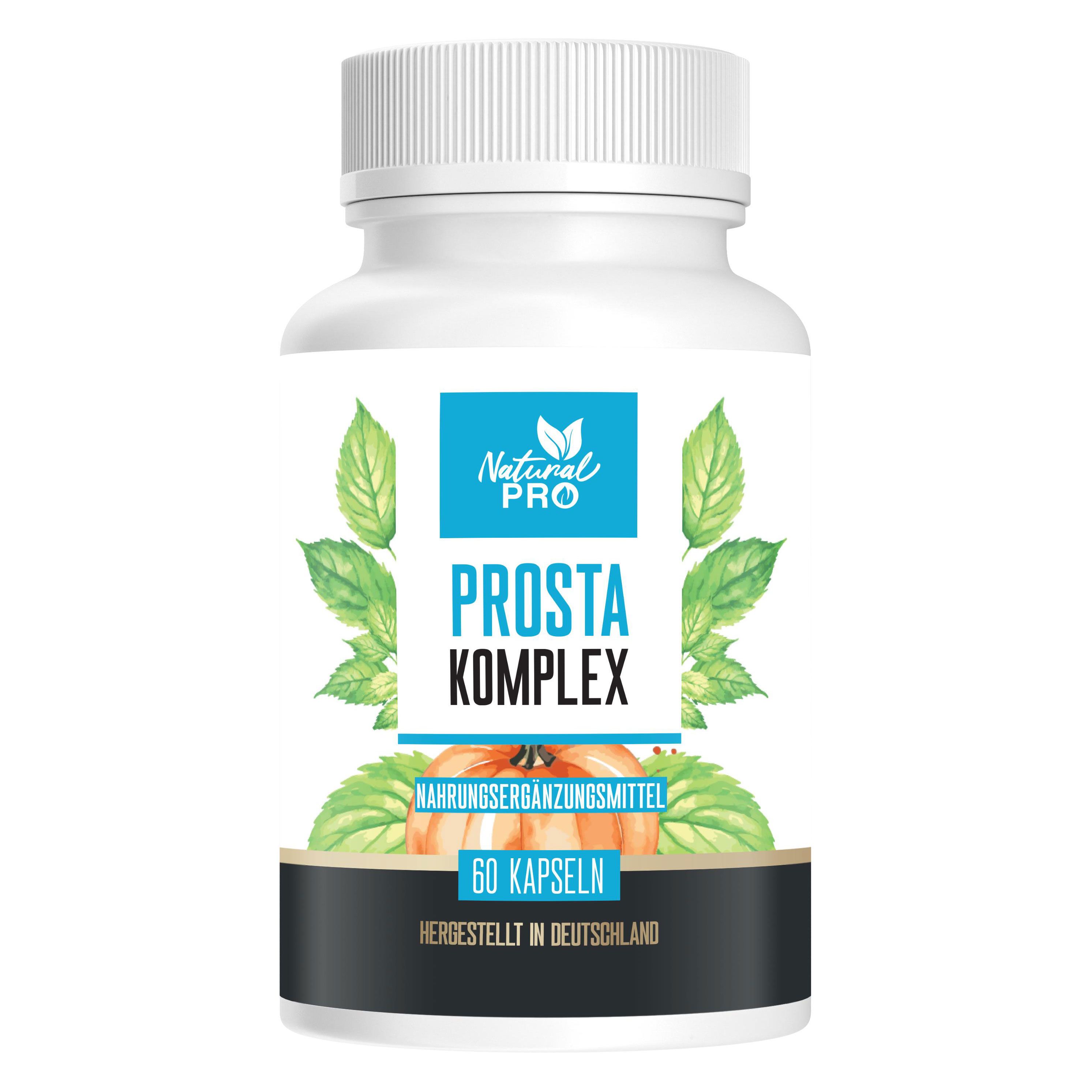 Weißes Pillenfläschchen mit blauem Etikett. Aufschrift: Natural Pro, Prosta Komplex, 60 Kapseln. Grünpflanzen-Dekoration.