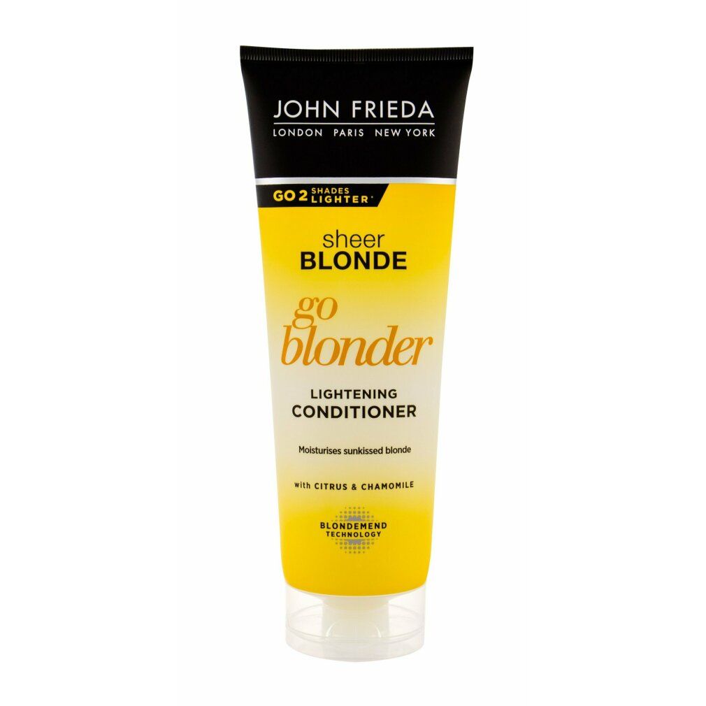 Gelbe Tube mit schwarzem Deckel. Aufschrift: John Frieda Sheer Blonde Go Blonder Lightening Conditioner. Enthält Zitrus & Kamille.