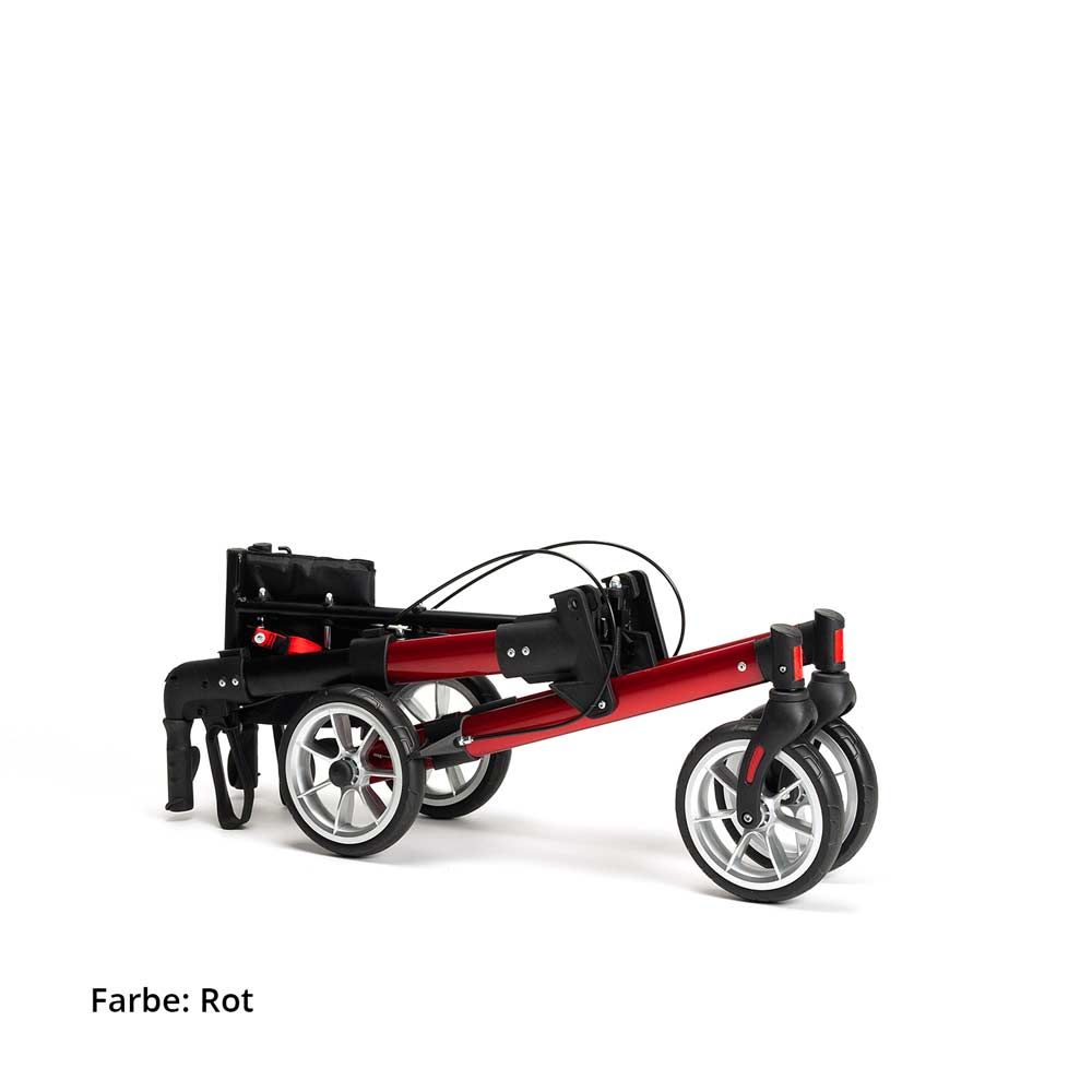 Zusammengeklappter Rollator rot mit vier Rädern. Schwarze Elemente. Farbe: Rot.