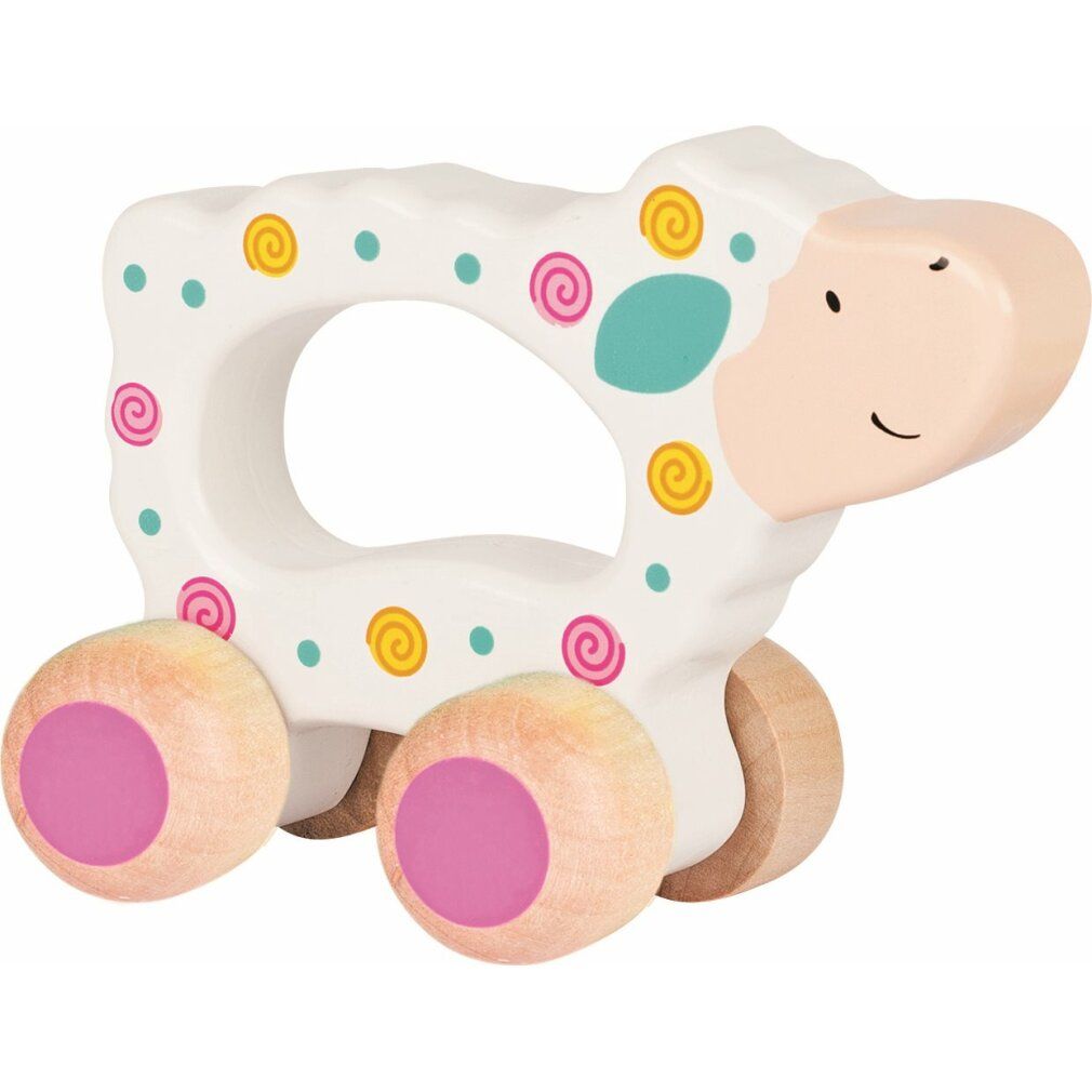 Holzspielzeug in Form eines Schafes mit Rädern. Weiß mit bunten Punkten und Wirbeln. Rosa Räder.