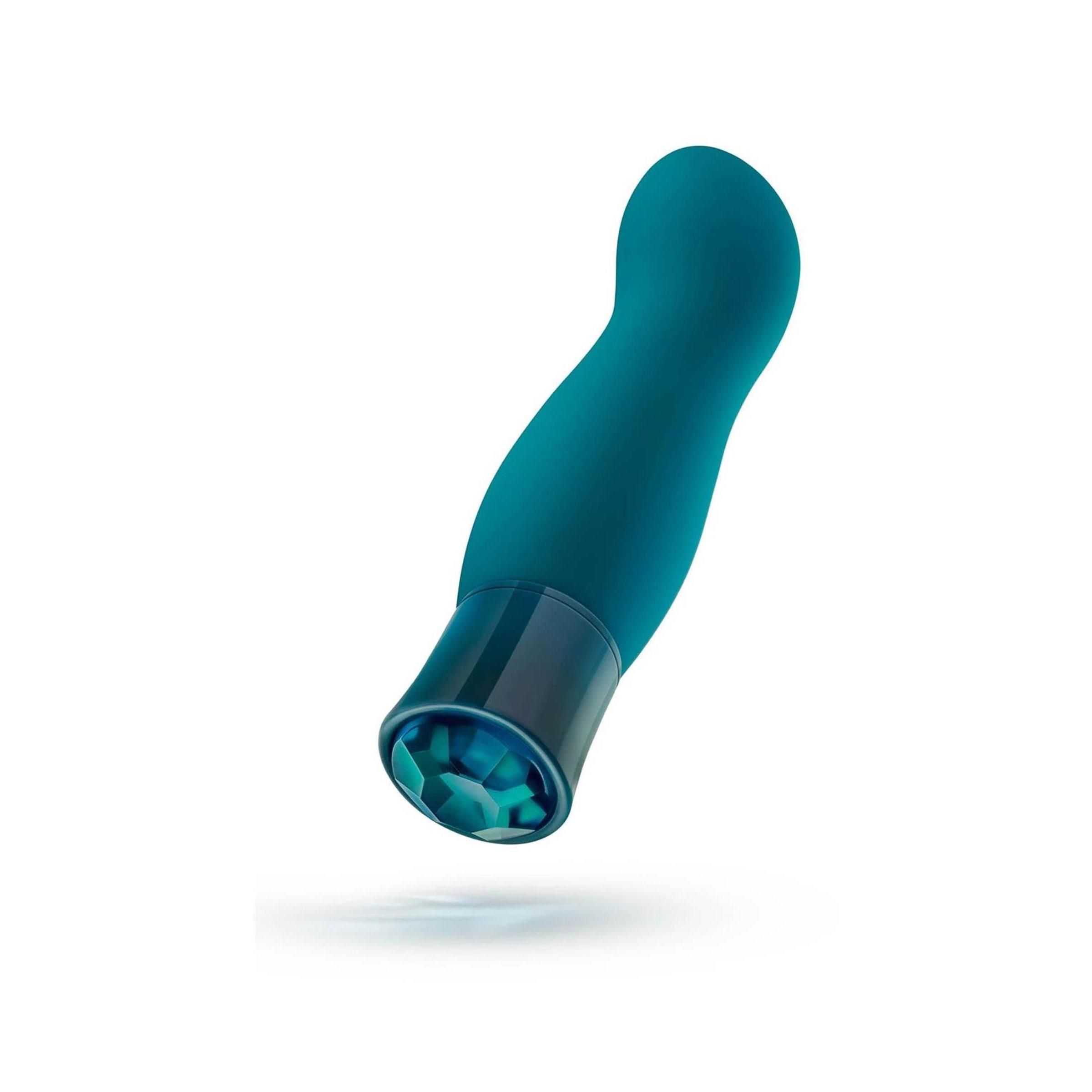 Türkisfarbener Vibrator mit Kristallspitze, leicht geneigt.