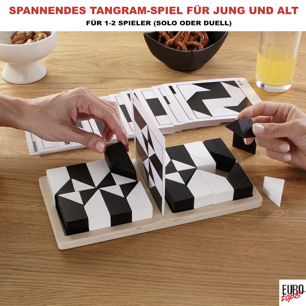 Zwei Personen spielen ein Tangram-Spiel mit schwarzen und weißen Blöcken.