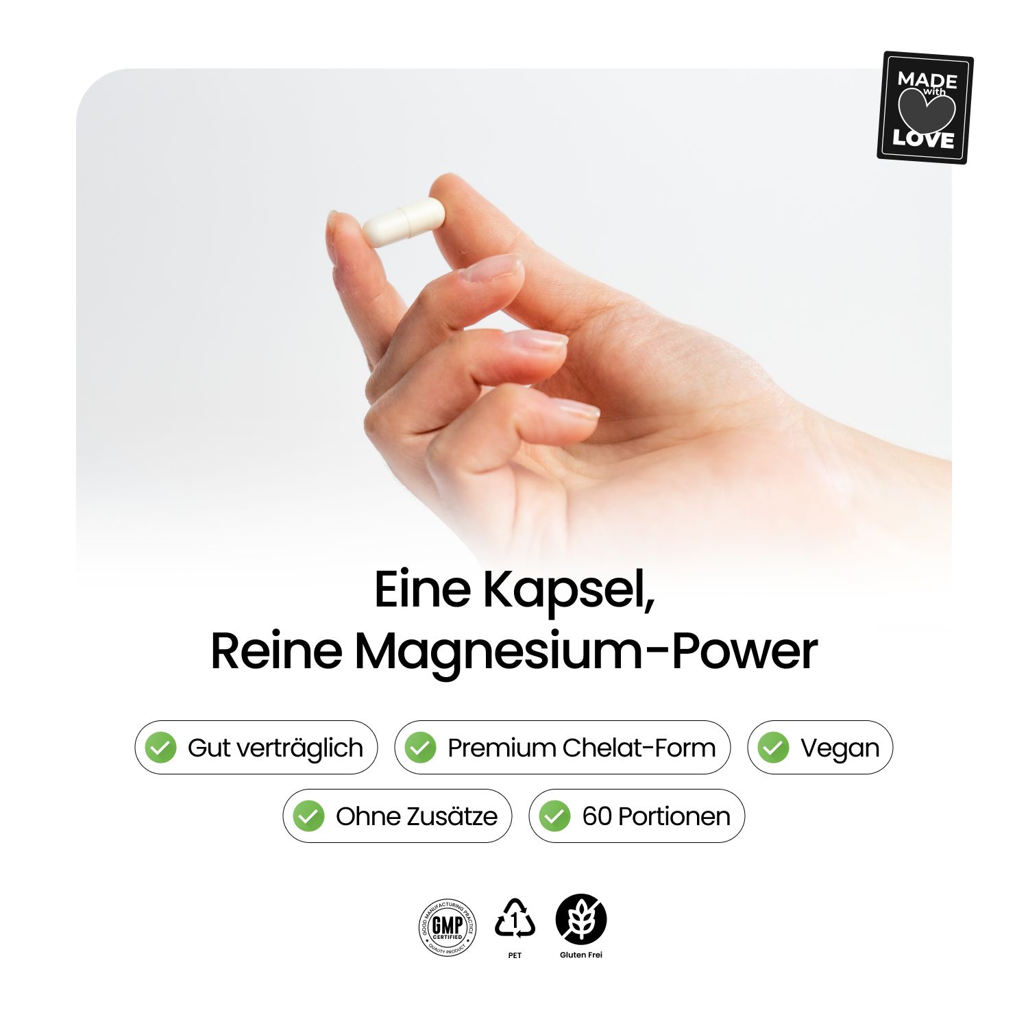 Hand hält eine Kapsel. Text: Eine Kapsel, Reine Magnesium-Power. Gut verträglich, Premium Chelat-Form, Vegan.