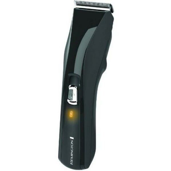 Schwarzer Haarschneider. Sichtbar: Ein/Aus-Schalter, Ladeanzeige, Klingenkopf. Marke: Remington.