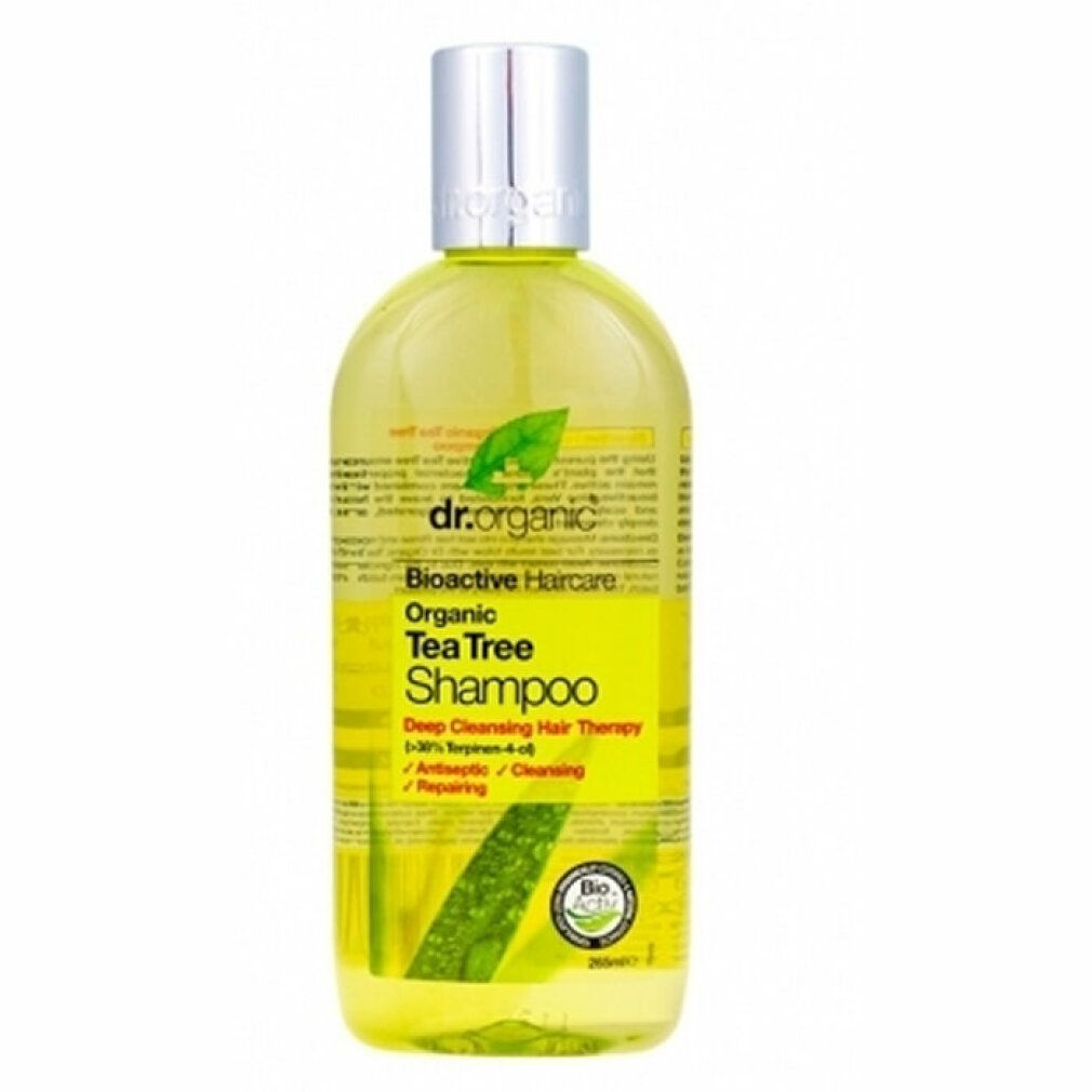 Dr. Organic Bio-Teebaum-Shampoo. Gelbe Flüssigkeit in einer Flasche mit silbernem Deckel. Aufschrift: Organic Tea Tree Shampoo.